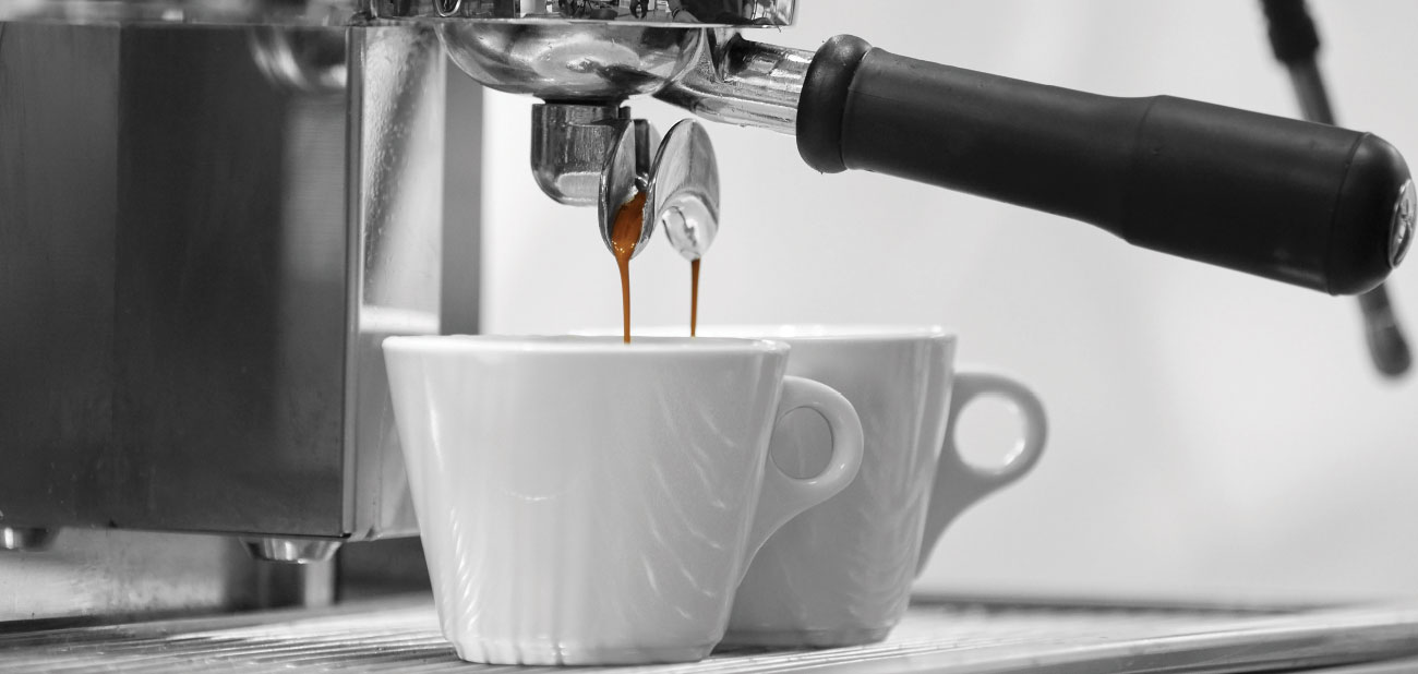 Image of a expresso machine making coffee